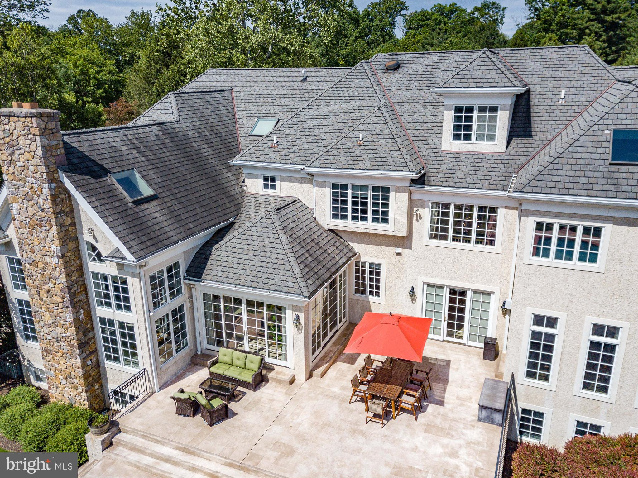 1049 McKean Road Ambler, PA 19002 - Photo 85 of 93 a aerial view of a house with a yard and balcony
