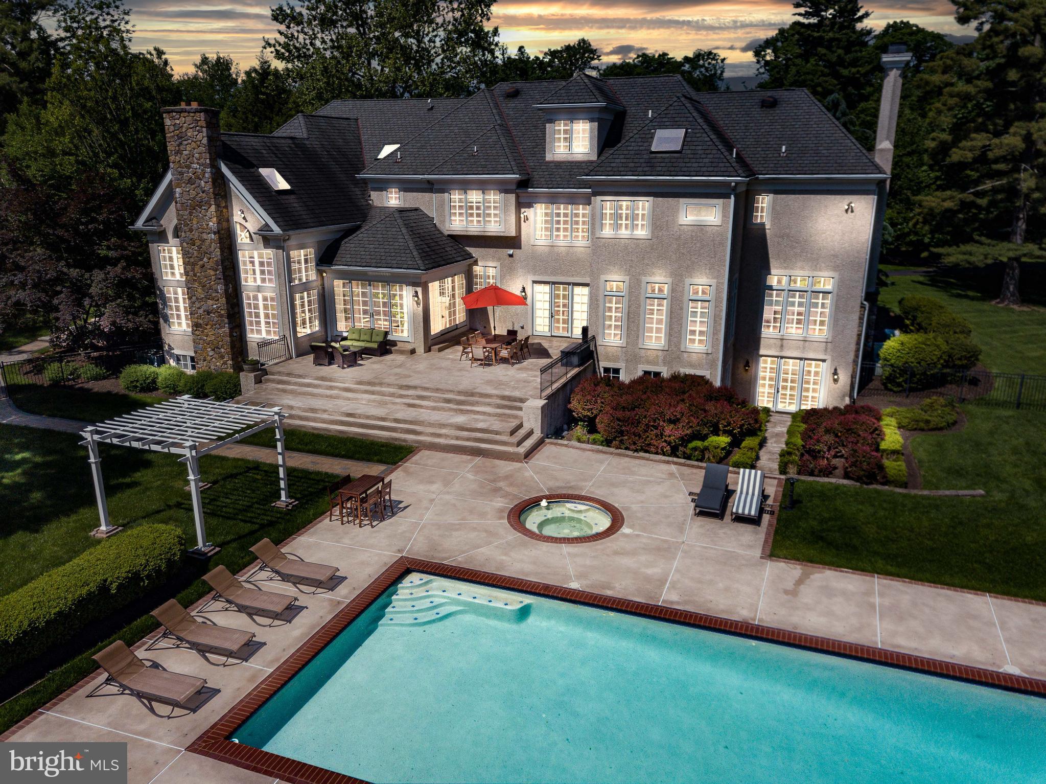 1049 McKean Road Ambler, PA 19002 - Photo 10 of 93 Aerial View of Pool and Patio - Virtual Dusk