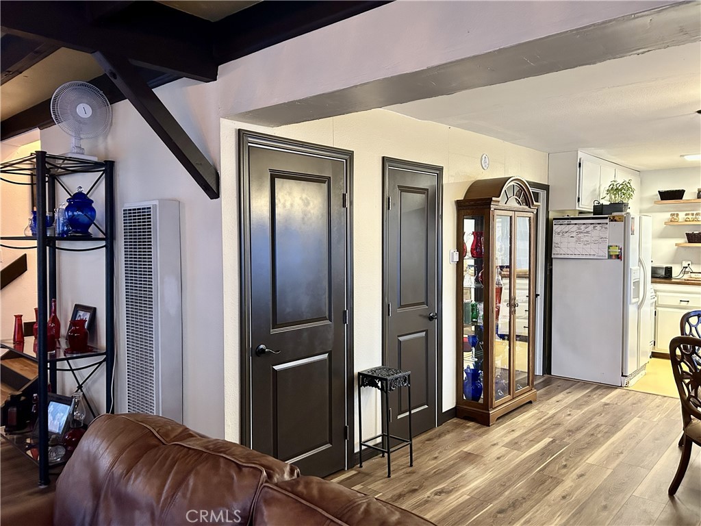 28639 Rostrata Avenue Lake Elsinore, CA 92532 - Photo 16 of 43 a view of a livingroom with furniture and front door