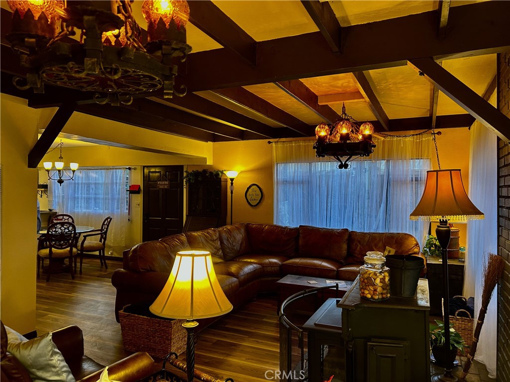 28639 Rostrata Avenue Lake Elsinore, CA 92532 - Photo 8 of 43 a view of a chairs and tables in the patio