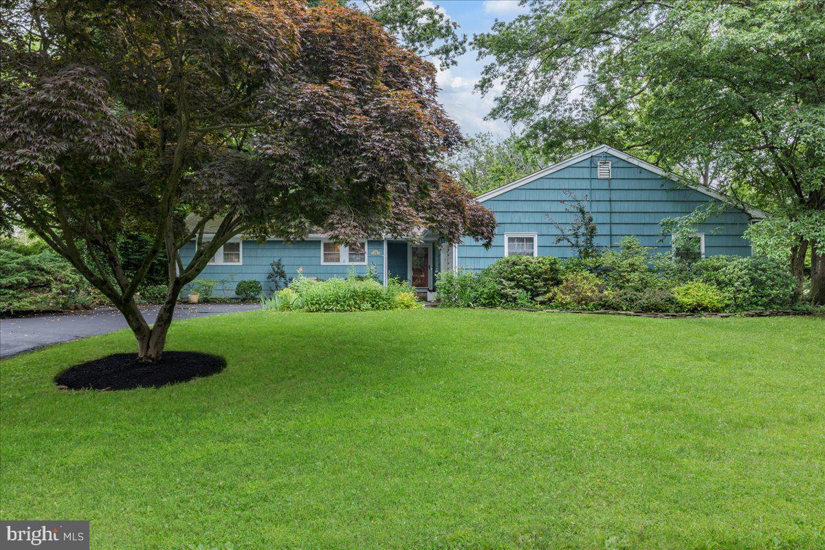 129 Poe Road Princeton, NJ 08540 - Photo 1 of 27 a front view of house with yard and green space