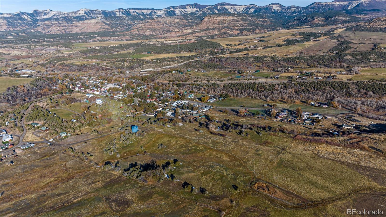 0 Tbd Collbran, CO 81624 - Photo 16 of 25 a view of lot of trees and houses
