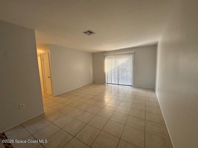 2232 Flower Tree Circle Melbourne, FL 32935 - Photo 6 of 17 a view of an empty room with a window