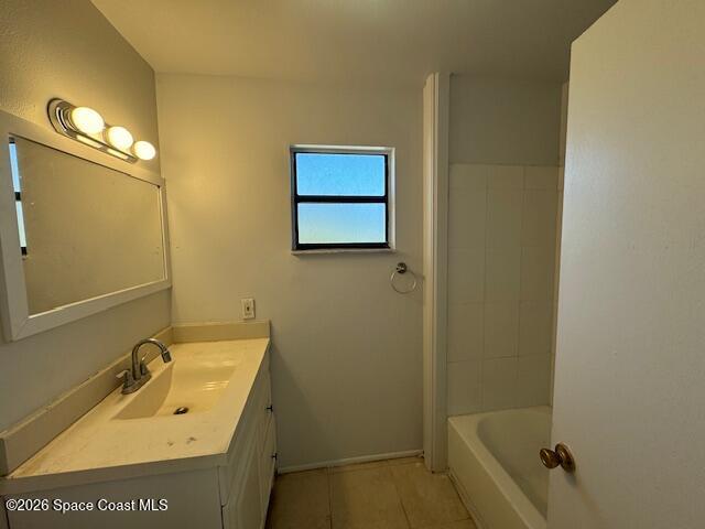 2232 Flower Tree Circle Melbourne, FL 32935 - Photo 10 of 13 a bathroom with a sink and mirror with toilet