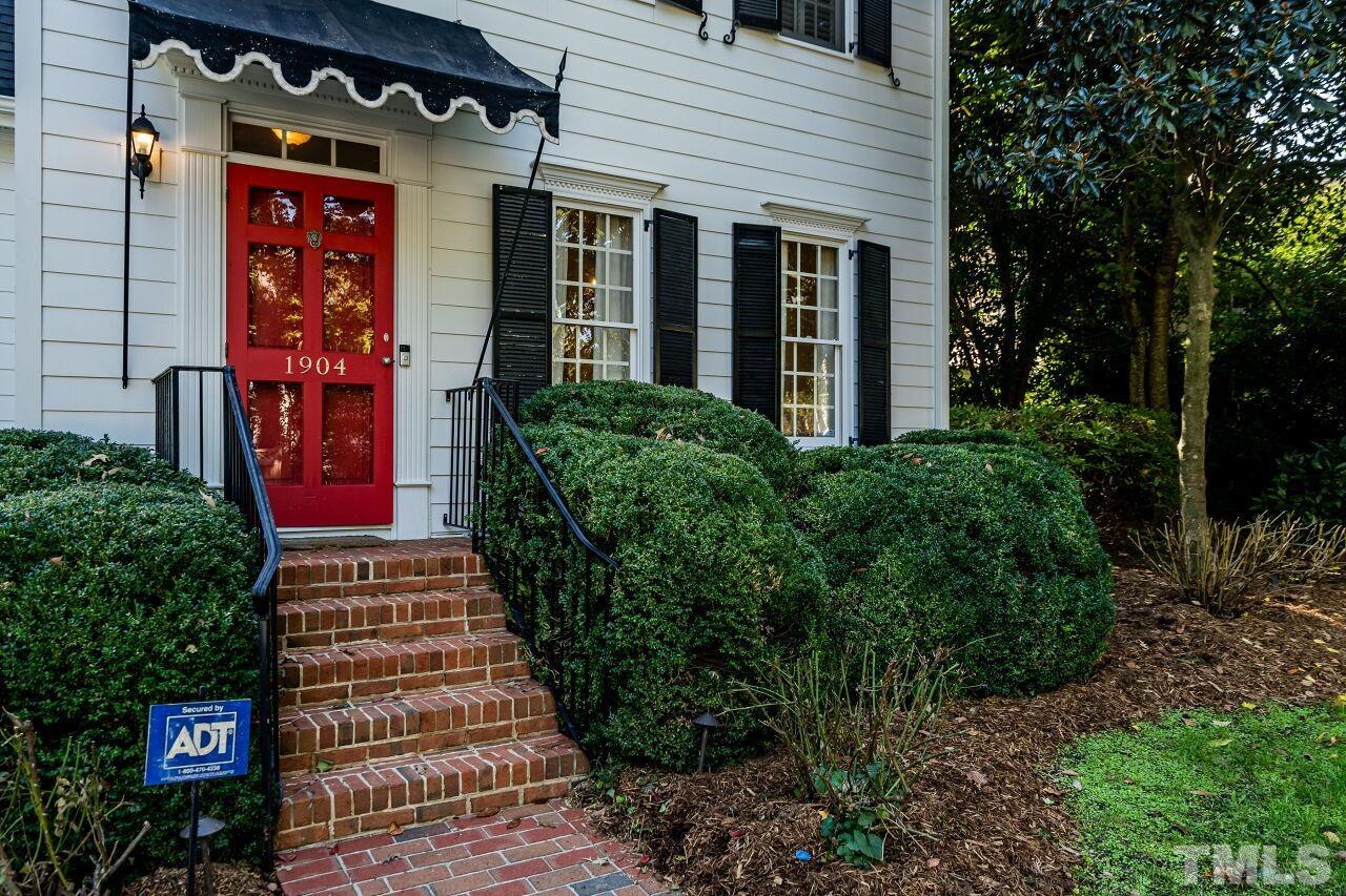 1904 White Oak Road Raleigh, NC 27608 - Photo 4 of 30 a view of a house with potted plants