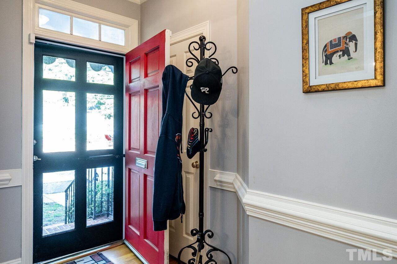 1904 White Oak Road Raleigh, NC 27608 - Photo 5 of 30 a front view of a house with a hallway
