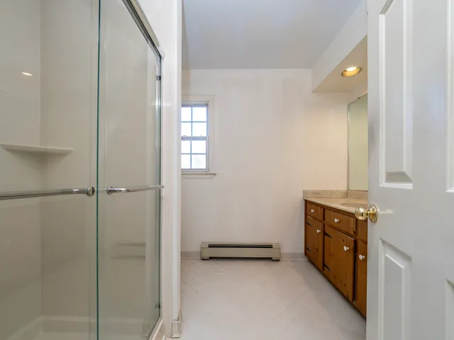 a view of a kitchen with a sink cabinets and a window