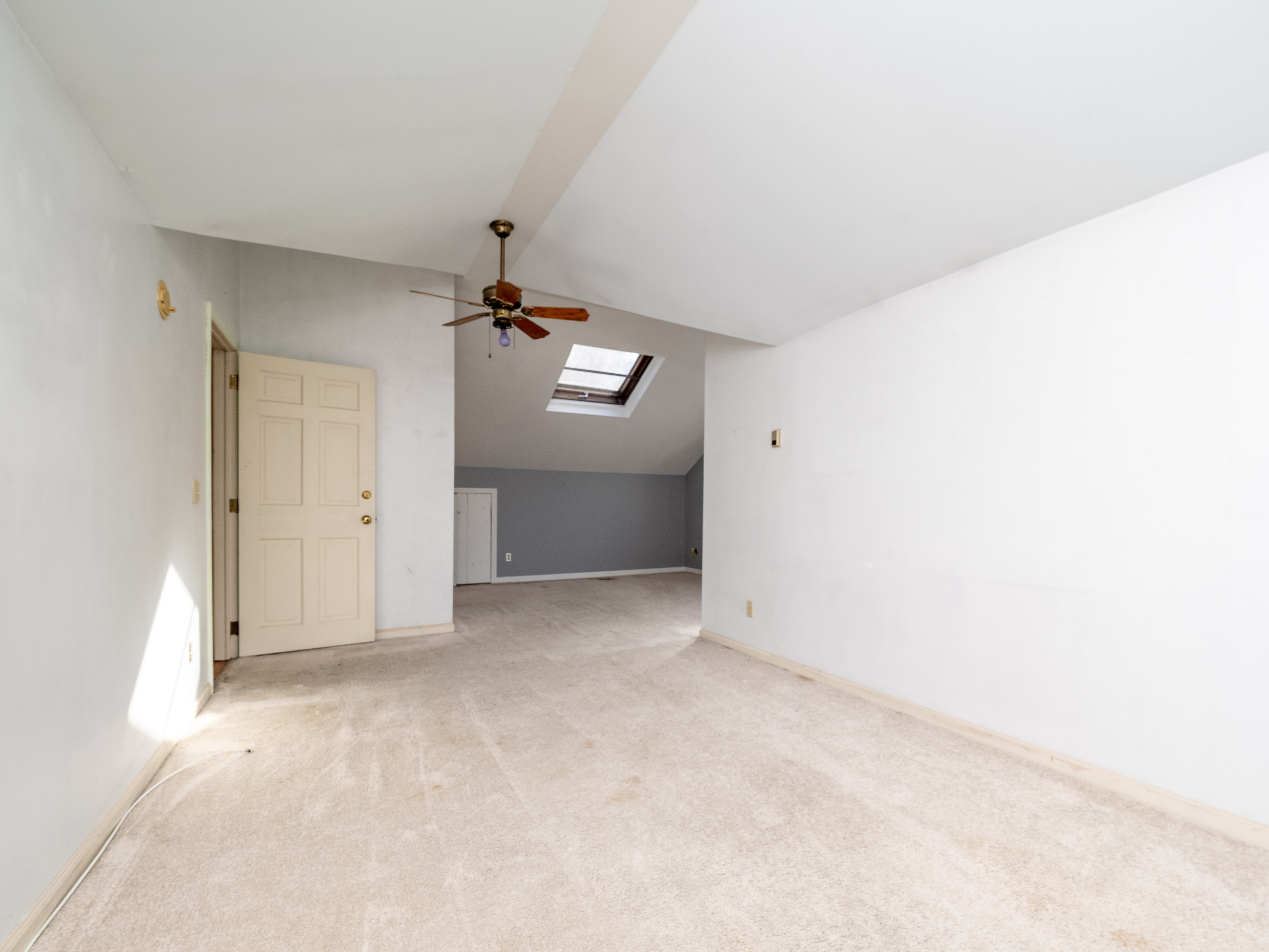41 Sullivan Drive Redding, CT 06896 - Photo 26 of 32 an empty room with chandelier fan and windows