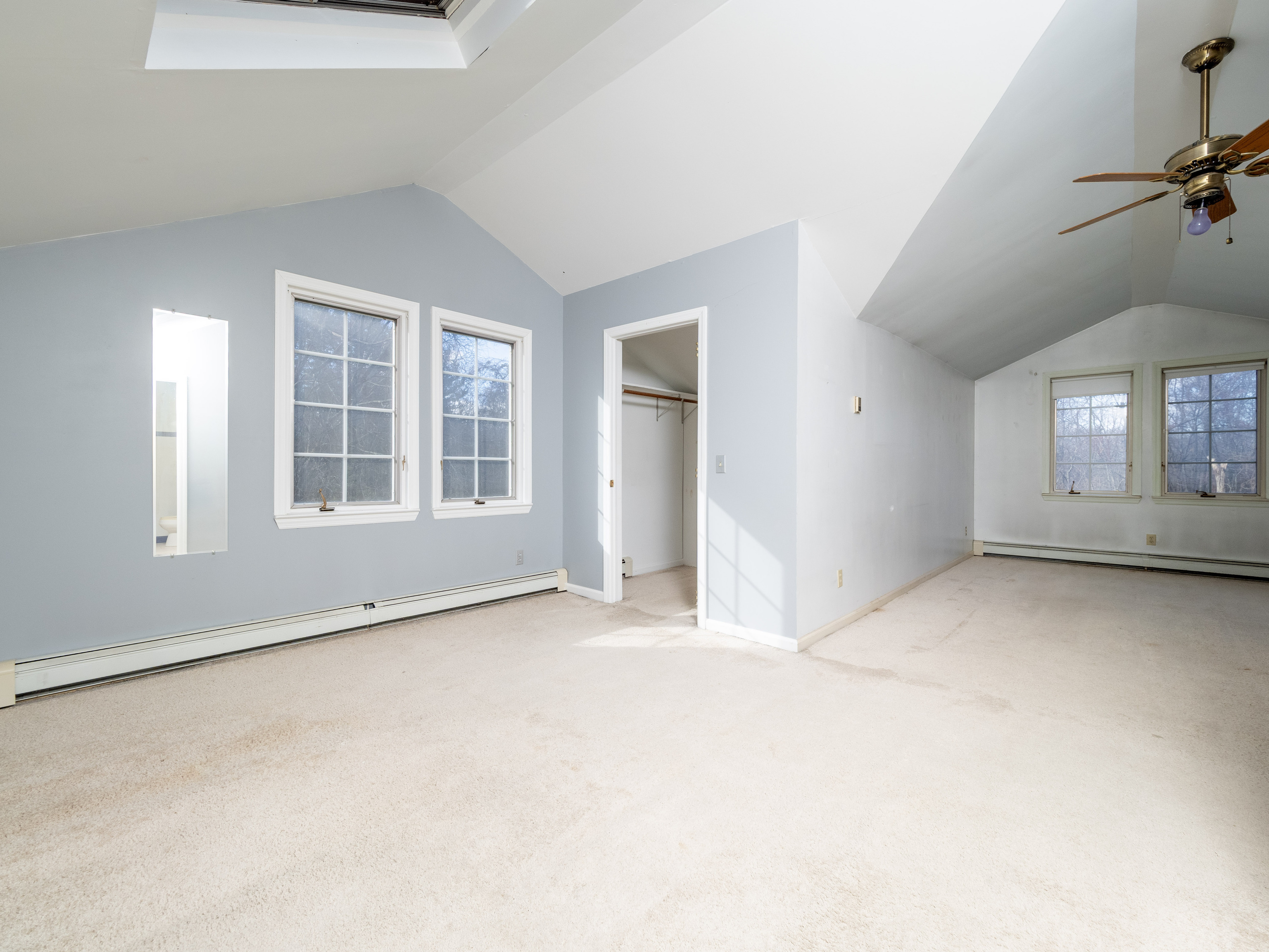 41 Sullivan Drive Redding, CT 06896 - Photo 28 of 32 an empty room with windows and entrance door