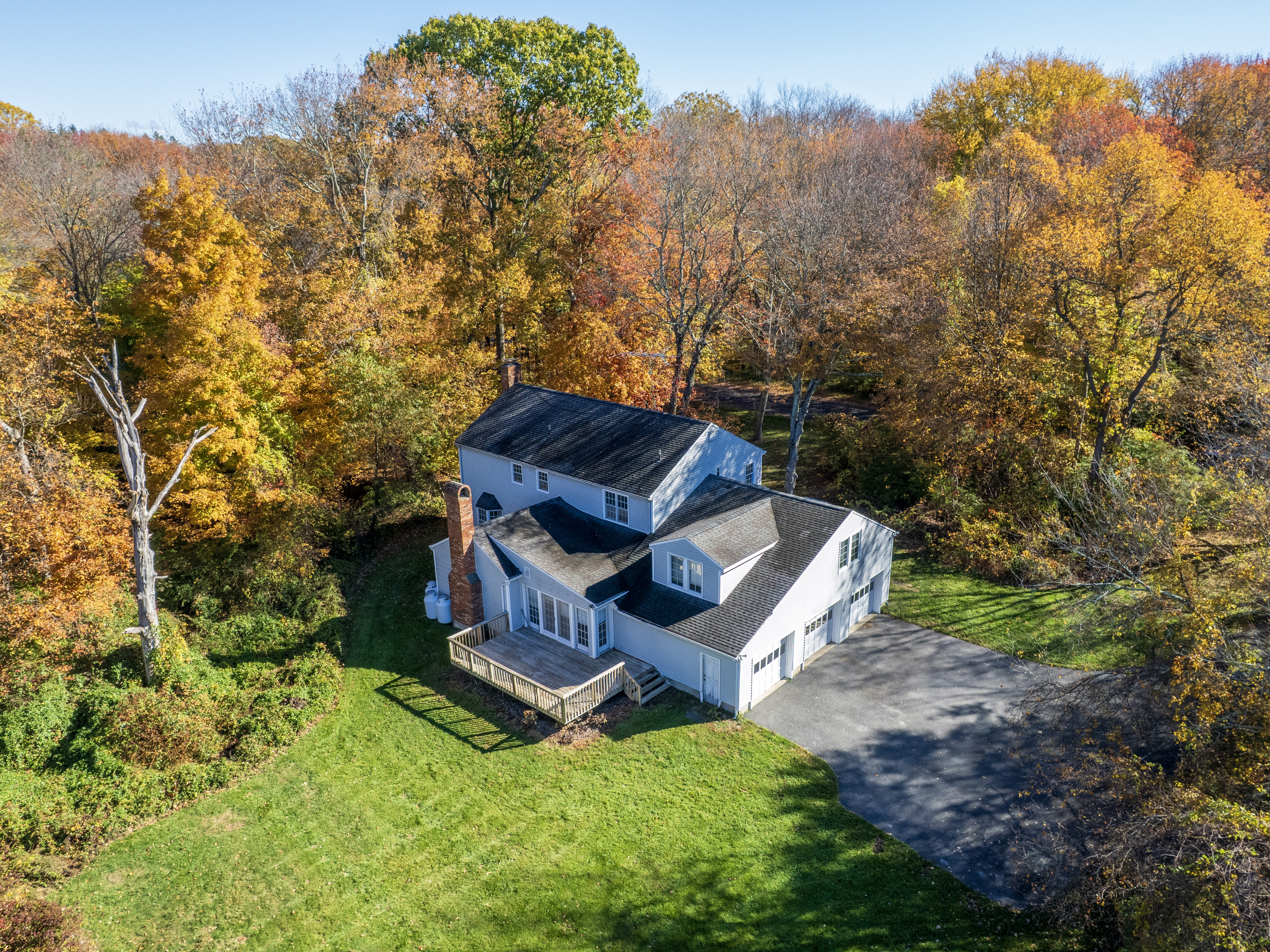 41 Sullivan Drive Redding, CT 06896 - Photo 29 of 32 a view of a small house with a yard