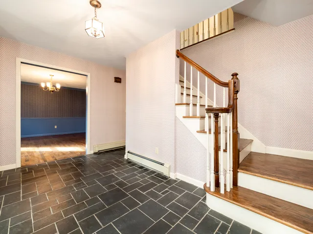 a view of entryway with wooden floor