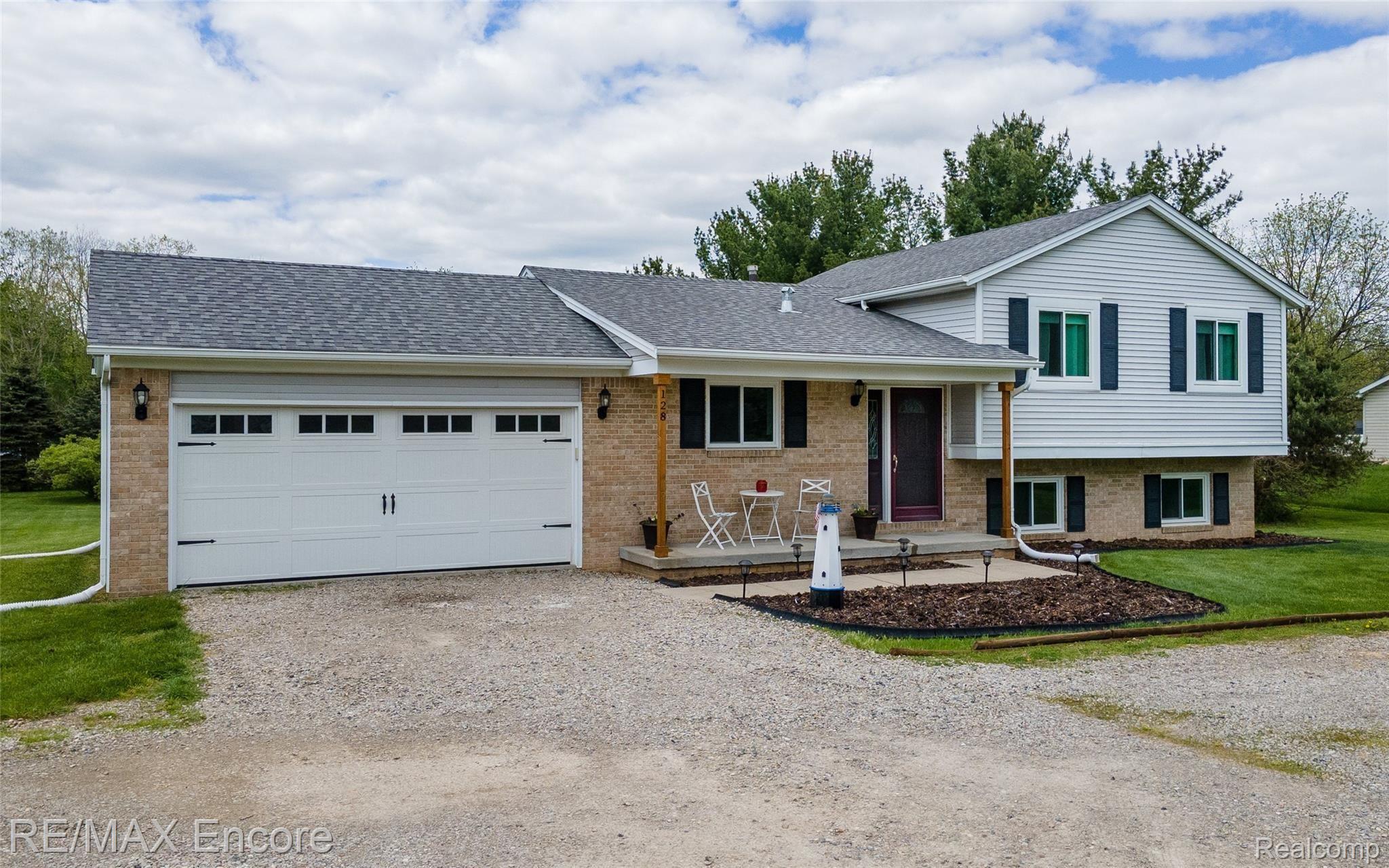 128 South Baldwin Road Oxford, MI 48371 - Photo 3 of 42 NICELY MAINTAINED INSIDE & OUT