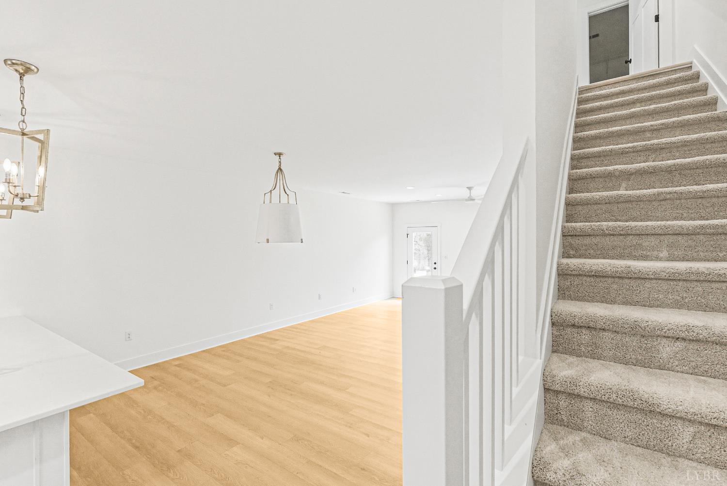 556 Leesville Road, Unit 406 Lynchburg, VA 24502 - Photo 6 of 39 a view of a room with stairs and a closet