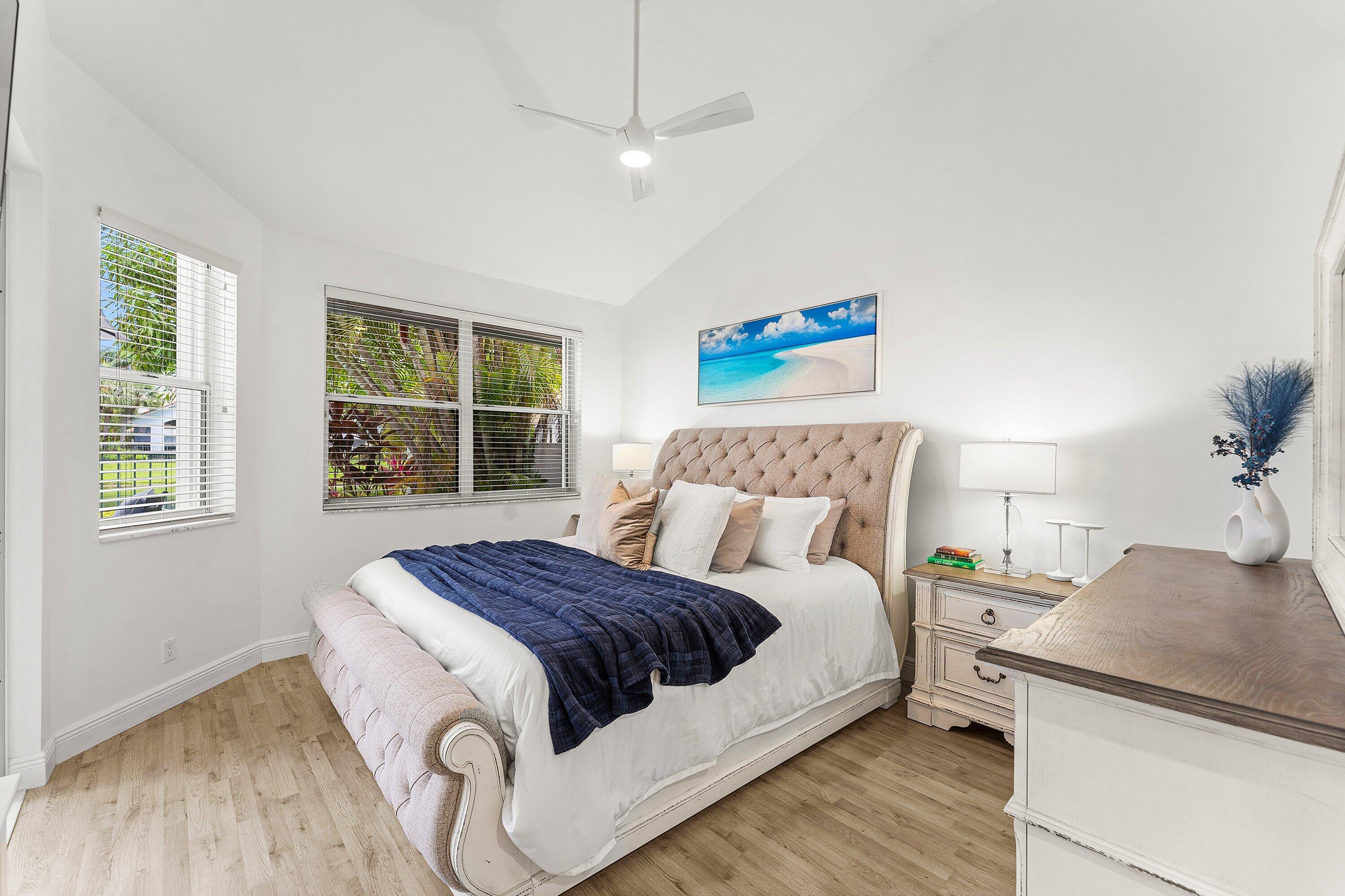 2221 Northwest 62nd Drive Boca Raton, FL 33496 - Photo 17 of 62 a bedroom with a bed and a window