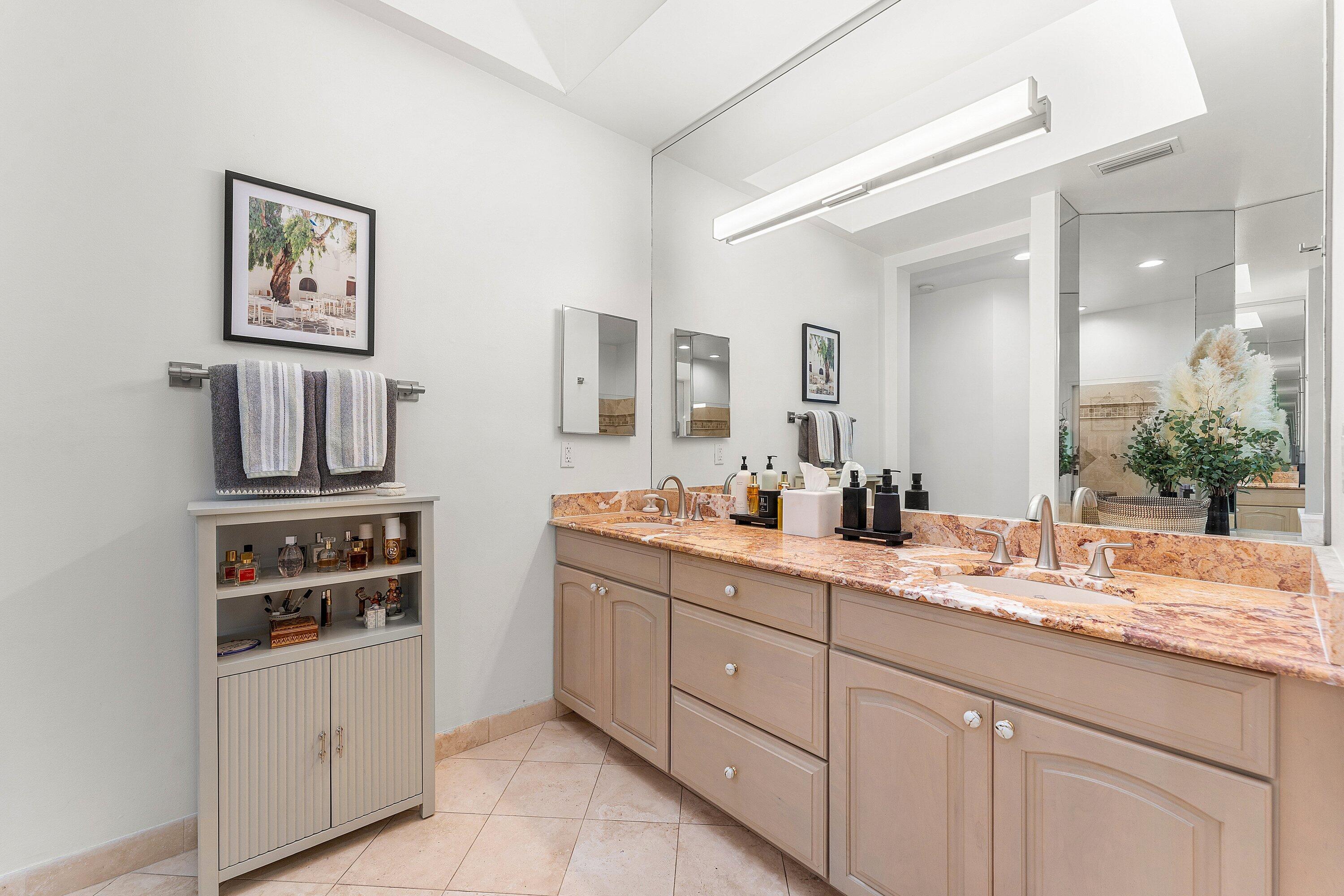 2221 Northwest 62nd Drive Boca Raton, FL 33496 - Photo 20 of 62 a bathroom with double vanity sink and a mirror