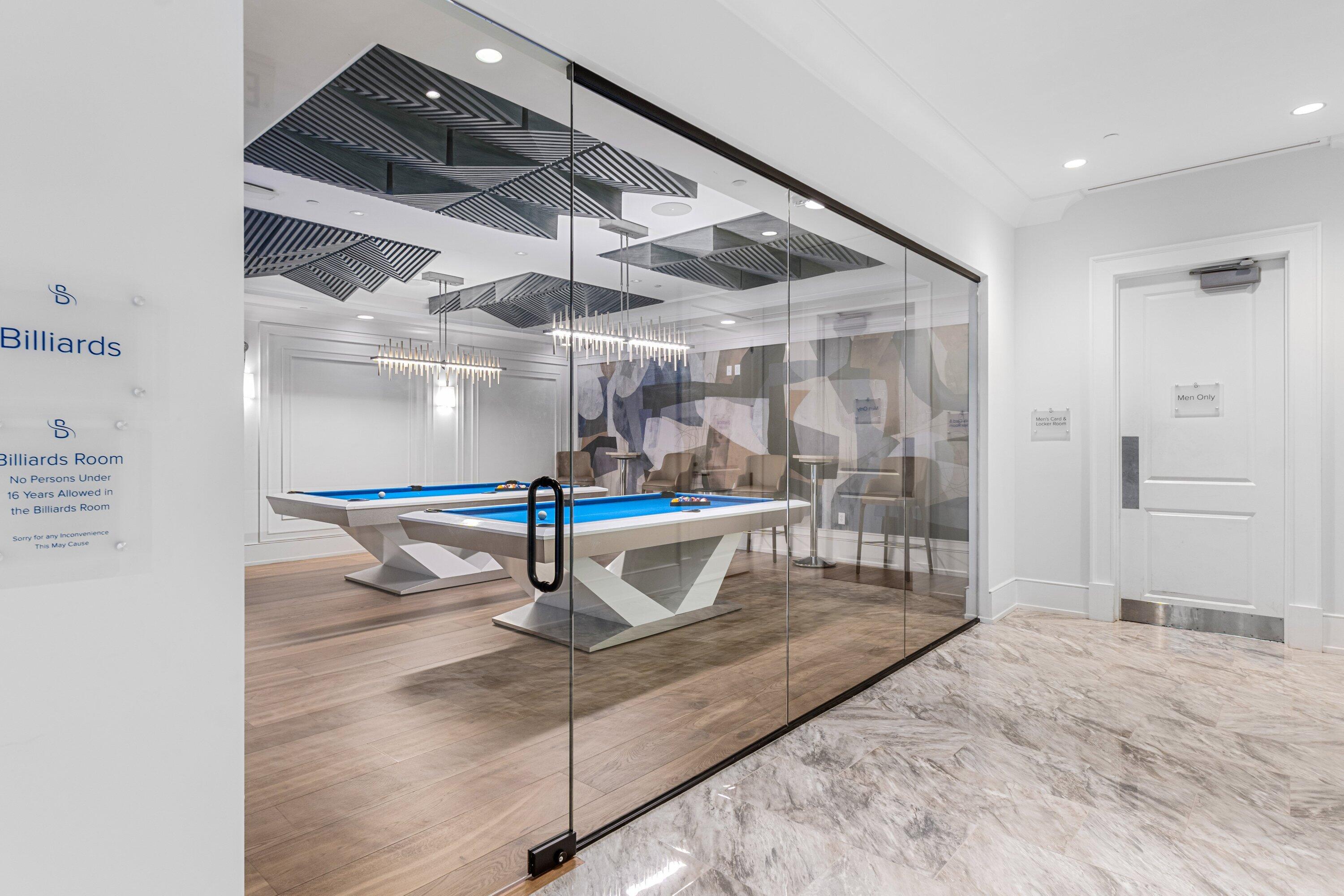 2221 Northwest 62nd Drive Boca Raton, FL 33496 - Photo 50 of 62 a room with wooden floor and white walls