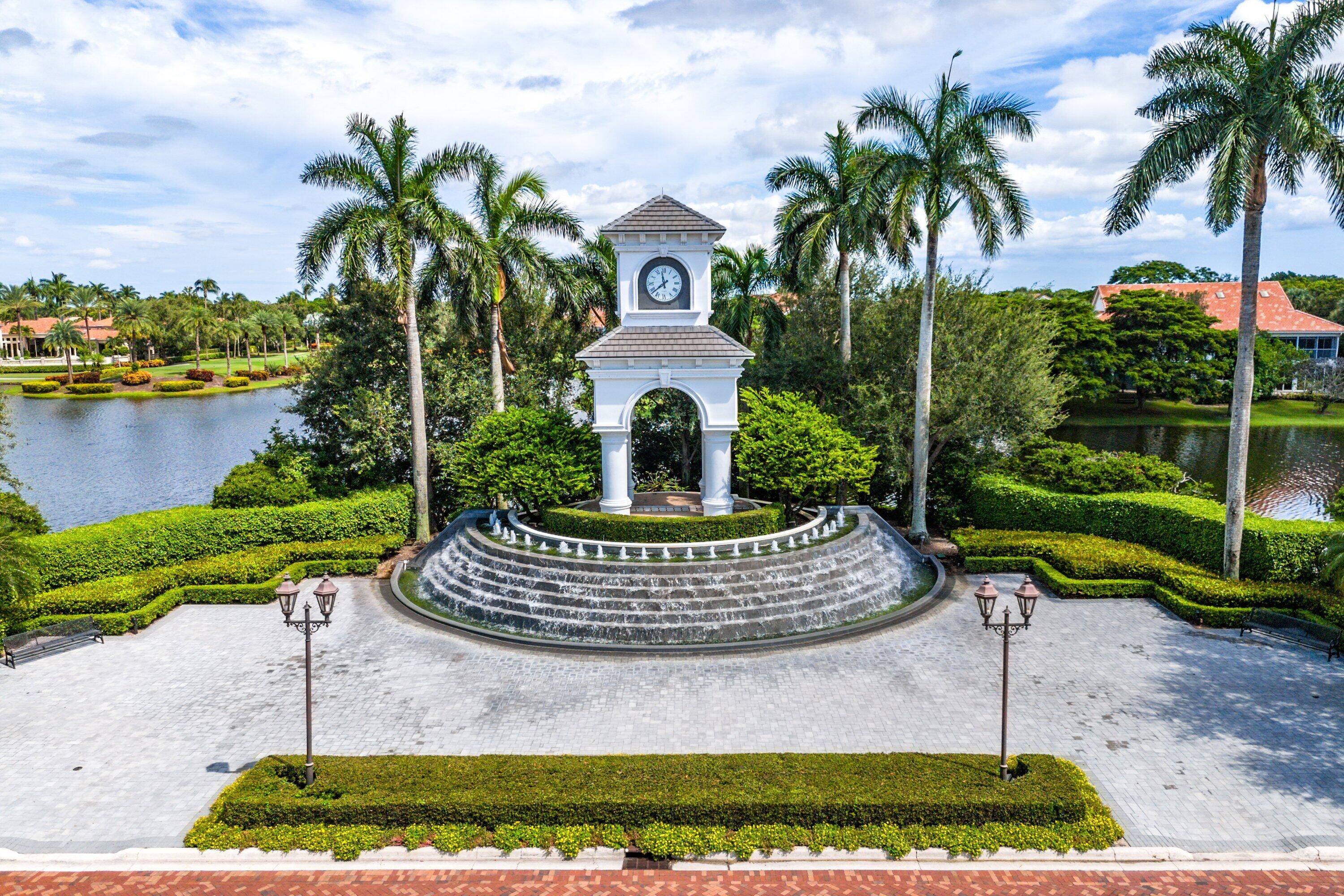 2221 Northwest 62nd Drive Boca Raton, FL 33496 - Photo 57 of 62 a view of a house with a yard and potted plants