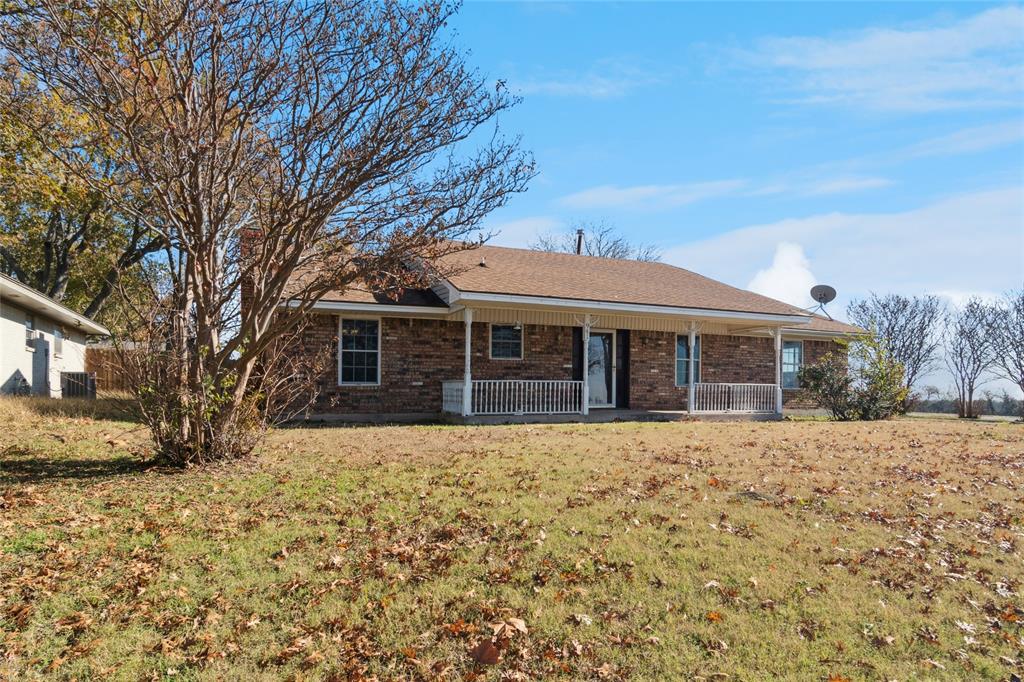 941 Maple Street Howe, TX 75459 - Photo 1 of 37 a front view of house with yard covered in snow