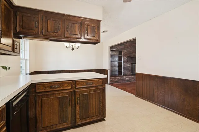 a view of a kitchen with electric appliances