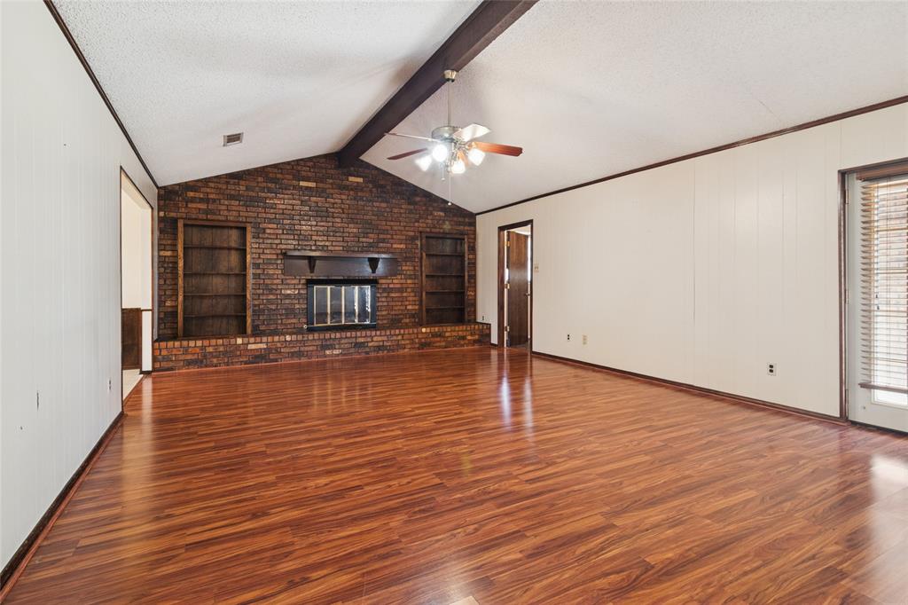 941 Maple Street Howe, TX 75459 - Photo 5 of 37 a view of a livingroom with wooden floor