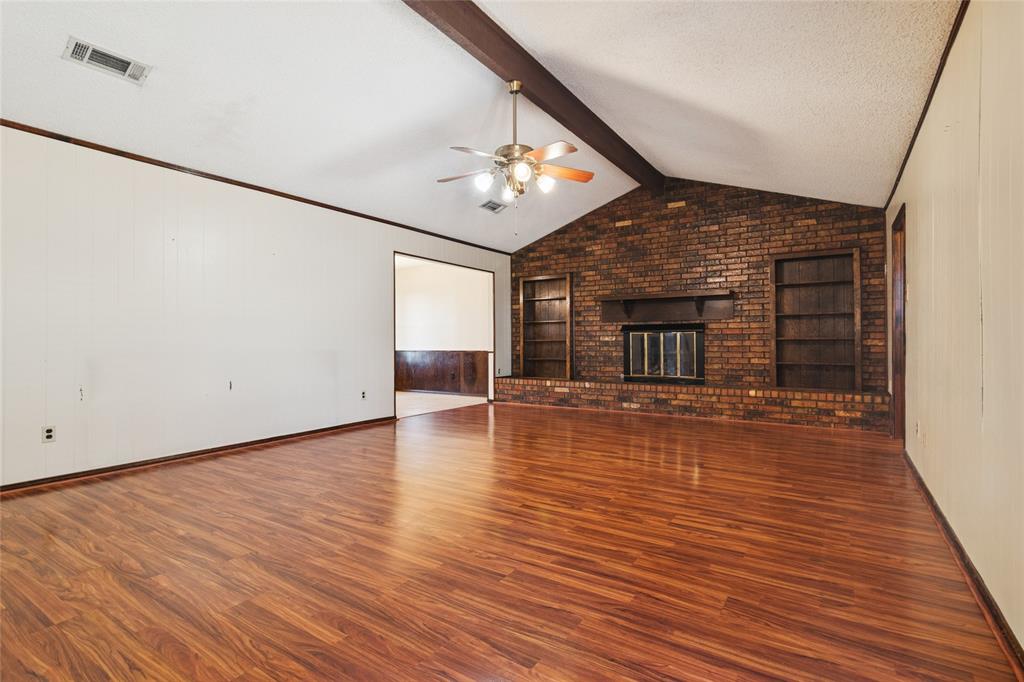 941 Maple Street Howe, TX 75459 - Photo 6 of 37 wooden floor in an empty room with a window
