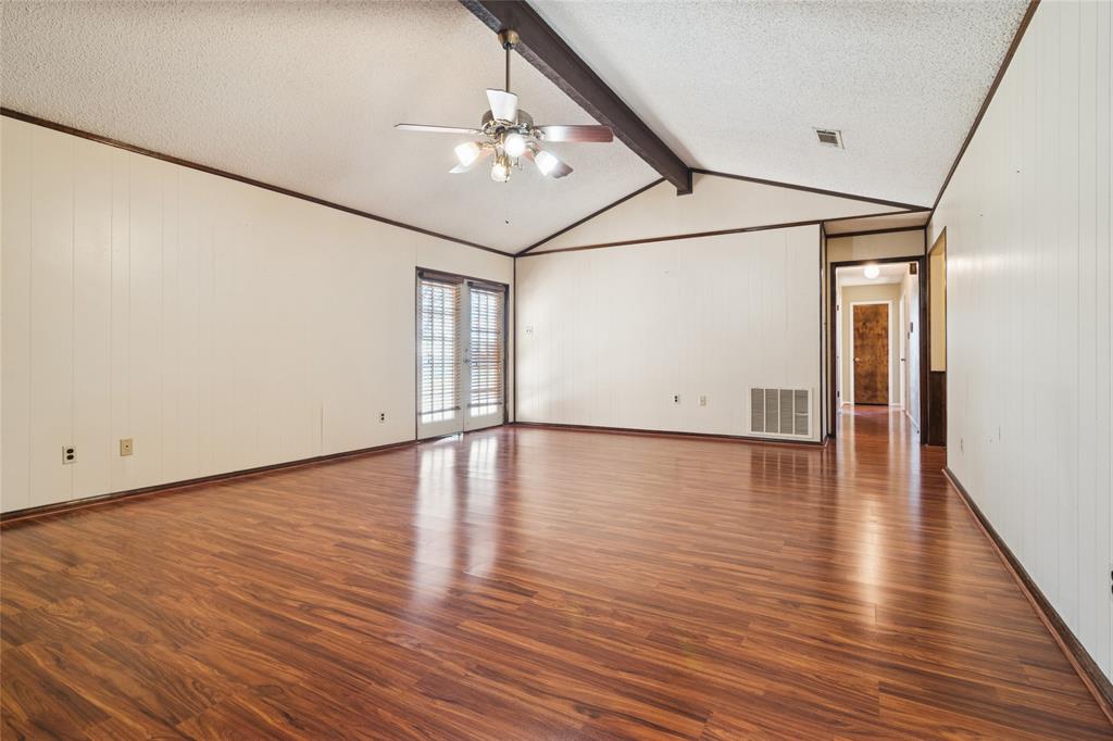 941 Maple Street Howe, TX 75459 - Photo 8 of 37 a view of an empty room with wooden floor