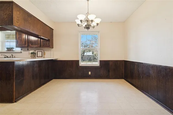 a bedroom with a bed and a cabinets
