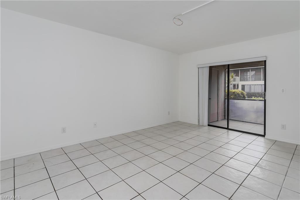 5501 Rattlesnake Hammock Road, Unit 601 Naples, FL 34113 - Photo 11 of 21 a view of an empty room and window