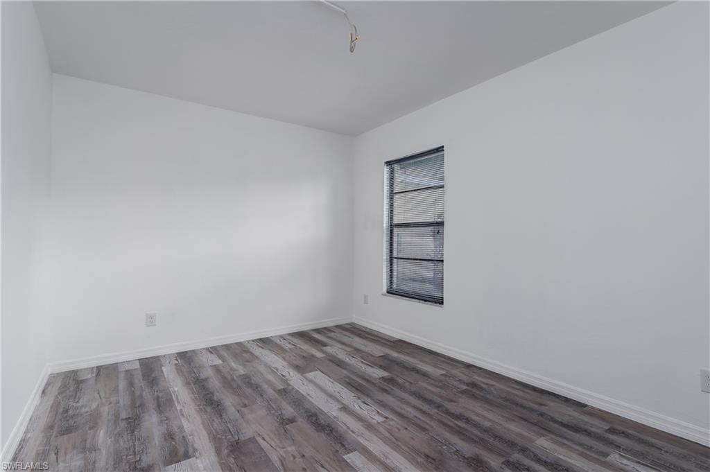 5501 Rattlesnake Hammock Road, Unit 601 Naples, FL 34113 - Photo 16 of 21 wooden floor in an empty room