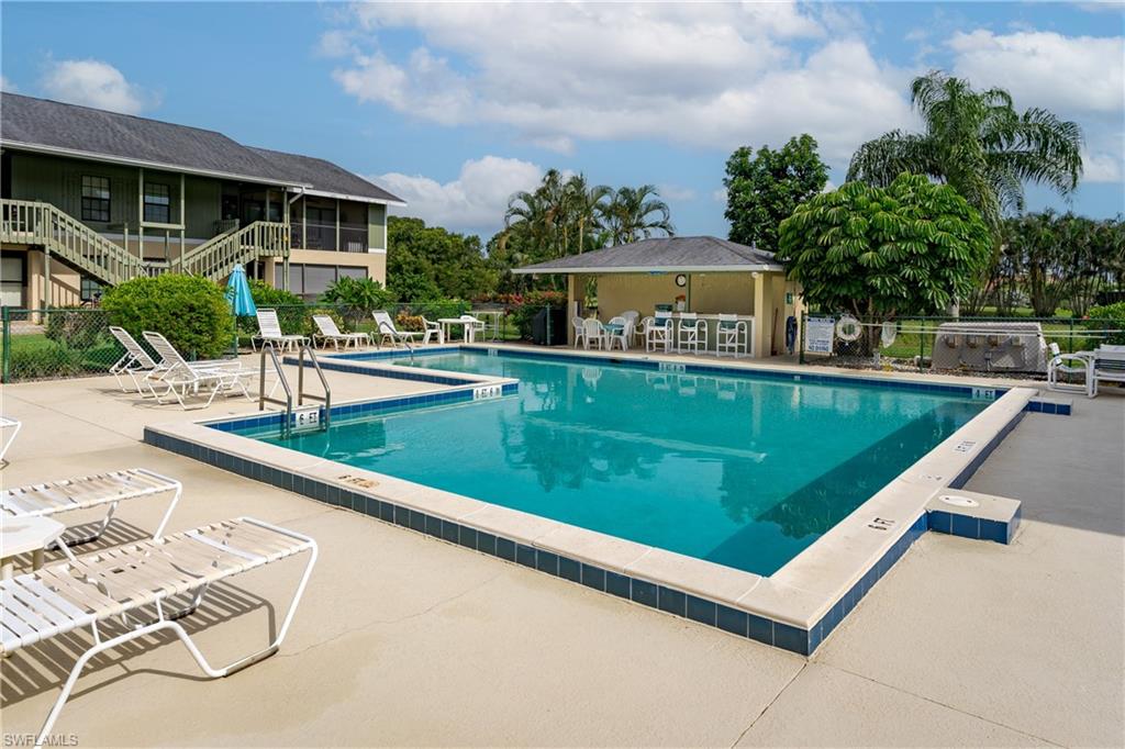 5501 Rattlesnake Hammock Road, Unit 601 Naples, FL 34113 - Photo 19 of 21 a view of a house with pool