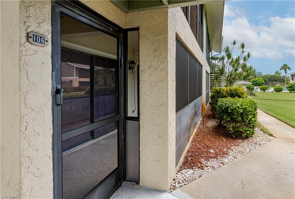 5501 Rattlesnake Hammock Road, Unit 601 Naples, FL 34113 - Photo 3 of 21 a backyard of a house