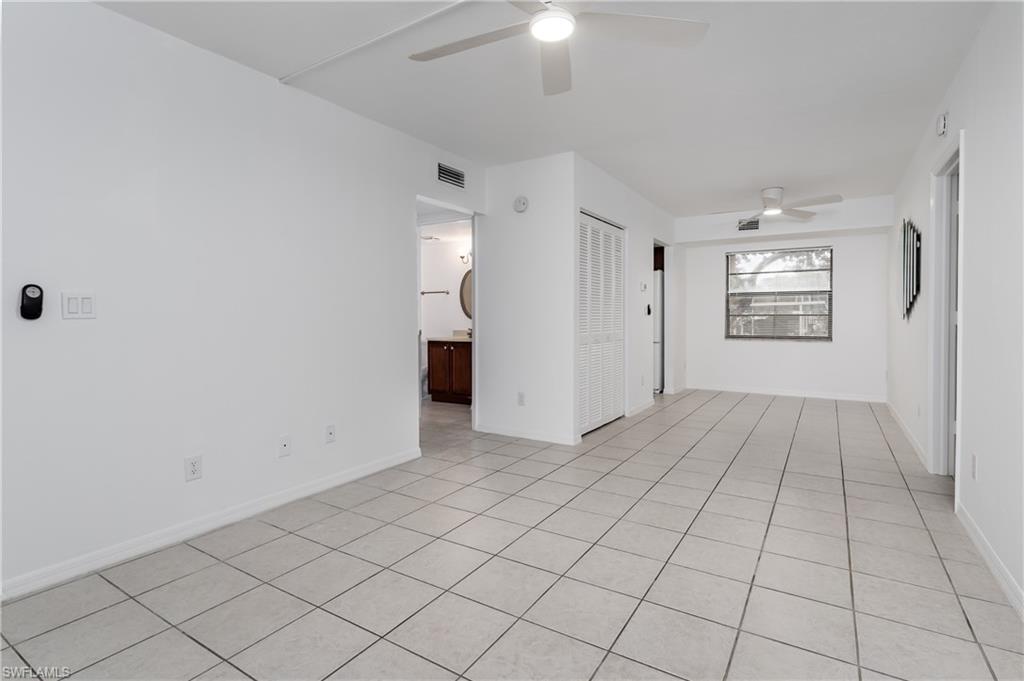5501 Rattlesnake Hammock Road, Unit 601 Naples, FL 34113 - Photo 9 of 21 a view of an empty room and window