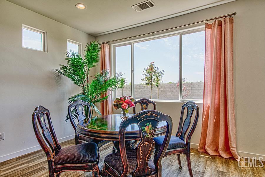 Undisclosed Address Bakersfield, CA 93311 - Photo 3 of 9 a view of a dining room with furniture window and outside view