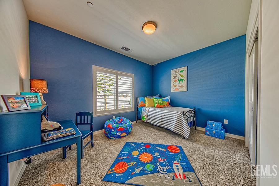 Undisclosed Address Bakersfield, CA 93311 - Photo 8 of 9 a room with toys and a wooden floor