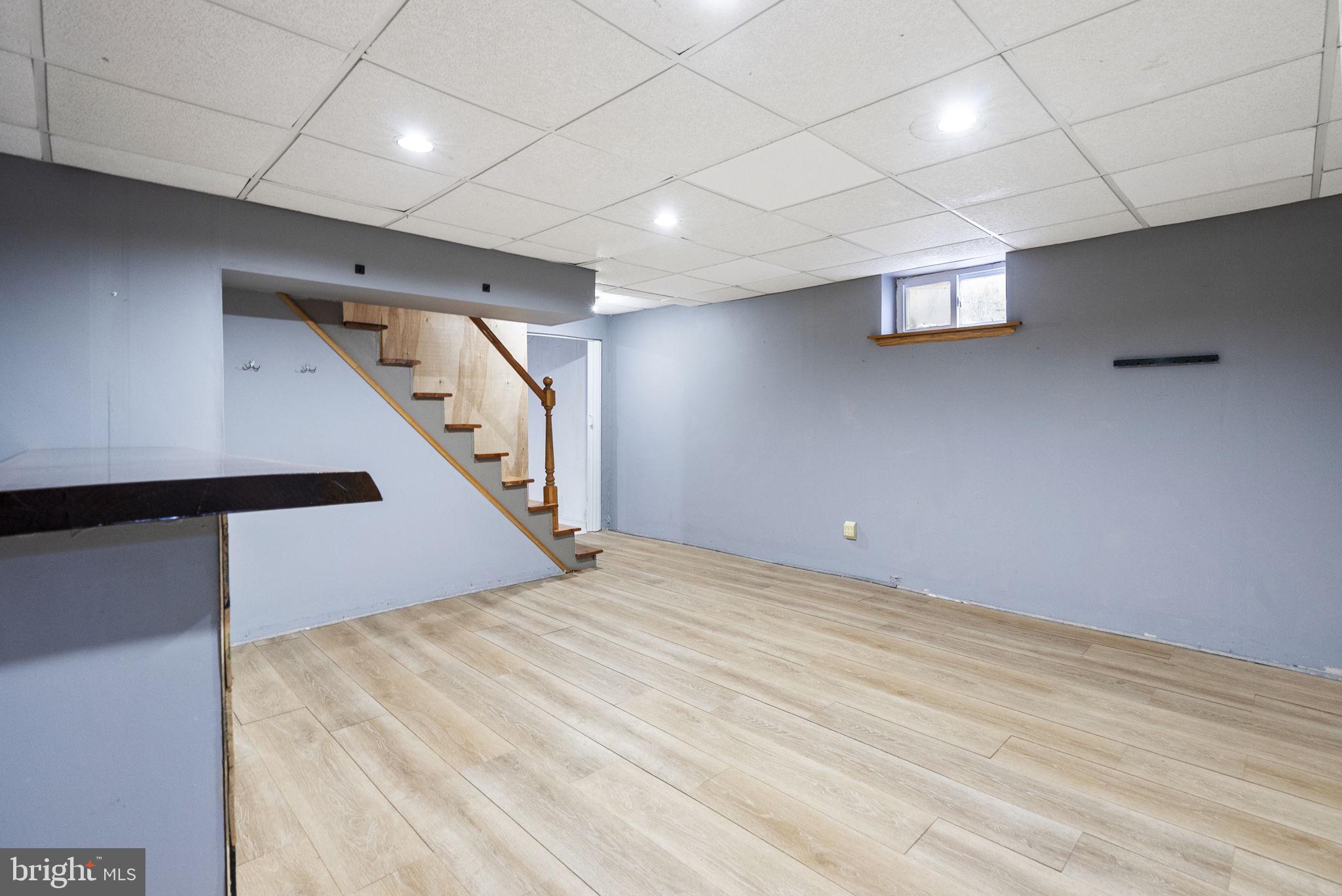 215 Allison Road Oreland, PA 19075 - Photo 19 of 39 a view of an empty room with stairs