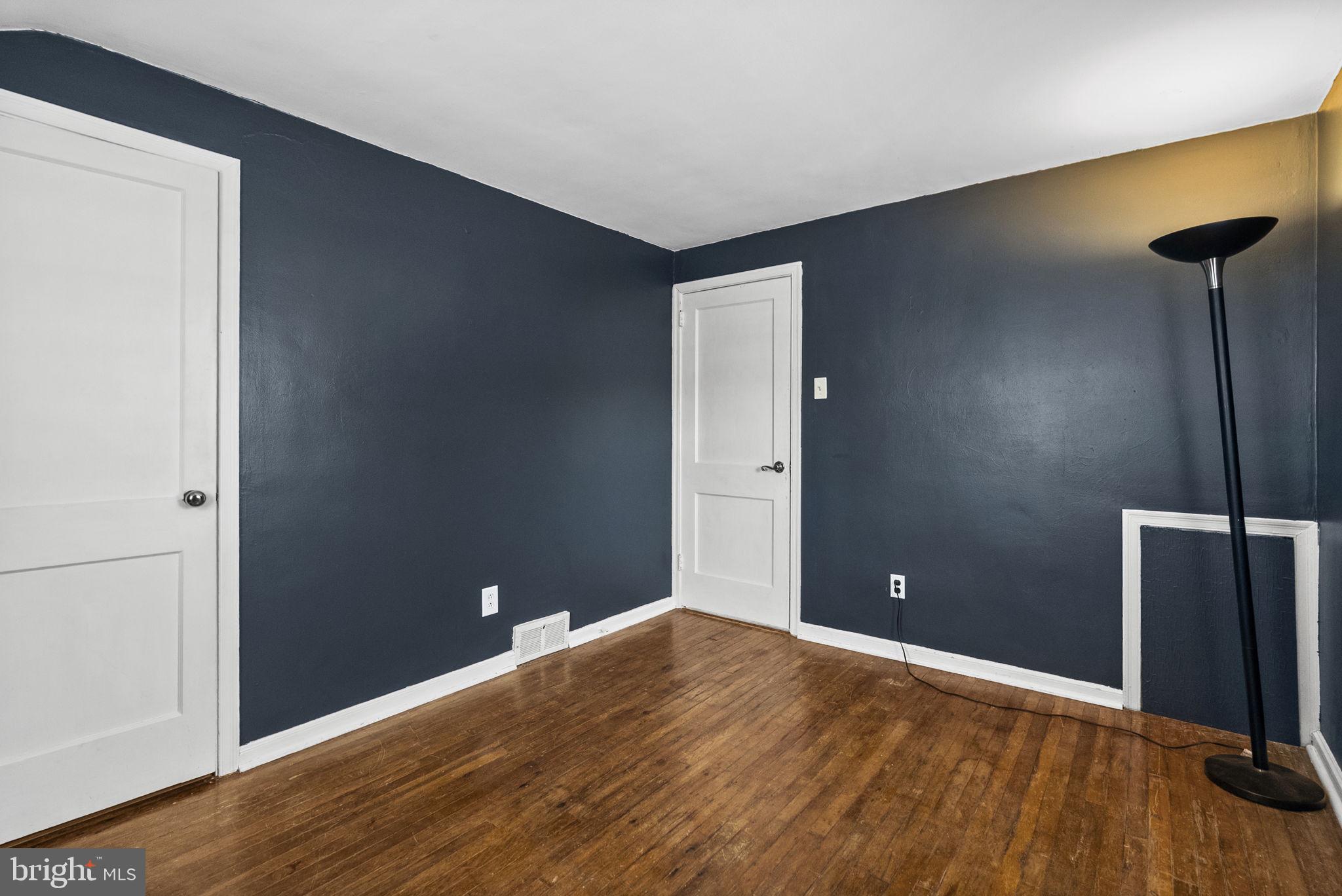 215 Allison Road Oreland, PA 19075 - Photo 27 of 39 a view of a room with wooden floor