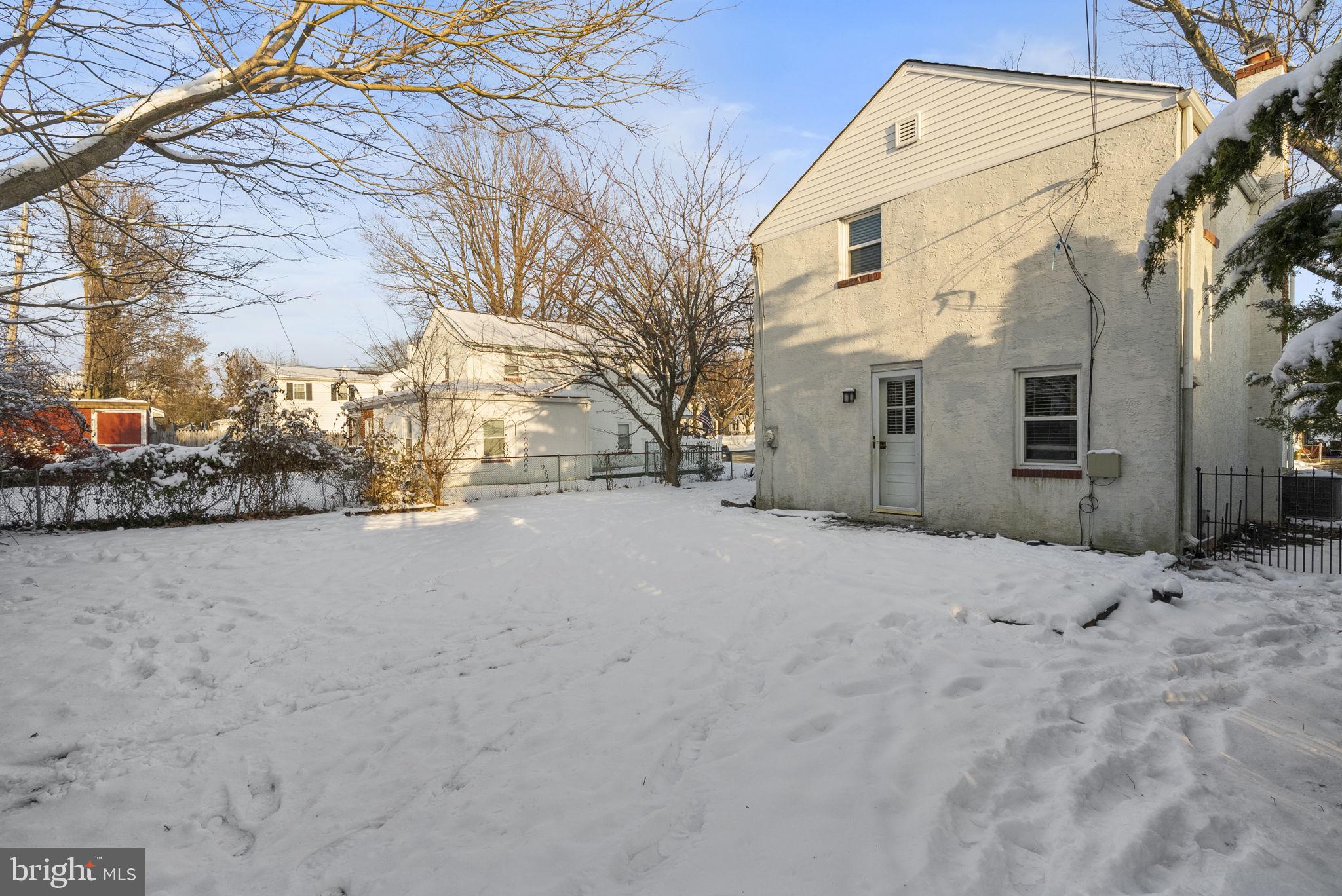 215 Allison Road Oreland, PA 19075 - Photo 33 of 39 a view of a house with a snow