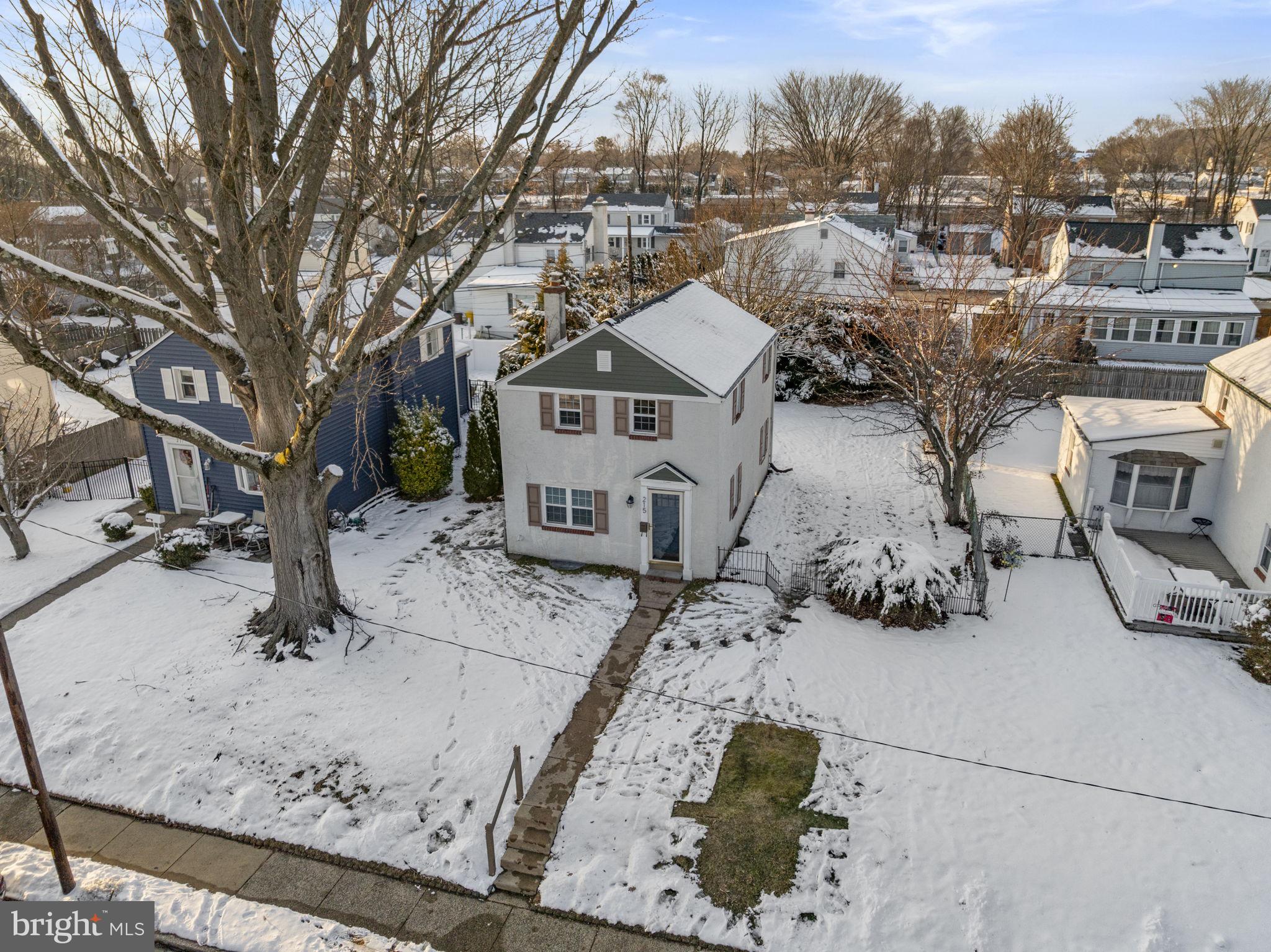 215 Allison Road Oreland, PA 19075 - Photo 35 of 39 a view of a house with a snow in the yard