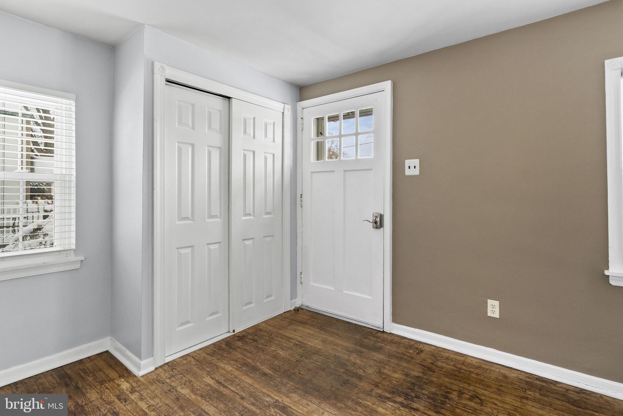 215 Allison Road Oreland, PA 19075 - Photo 4 of 39 an empty room with windows and closet
