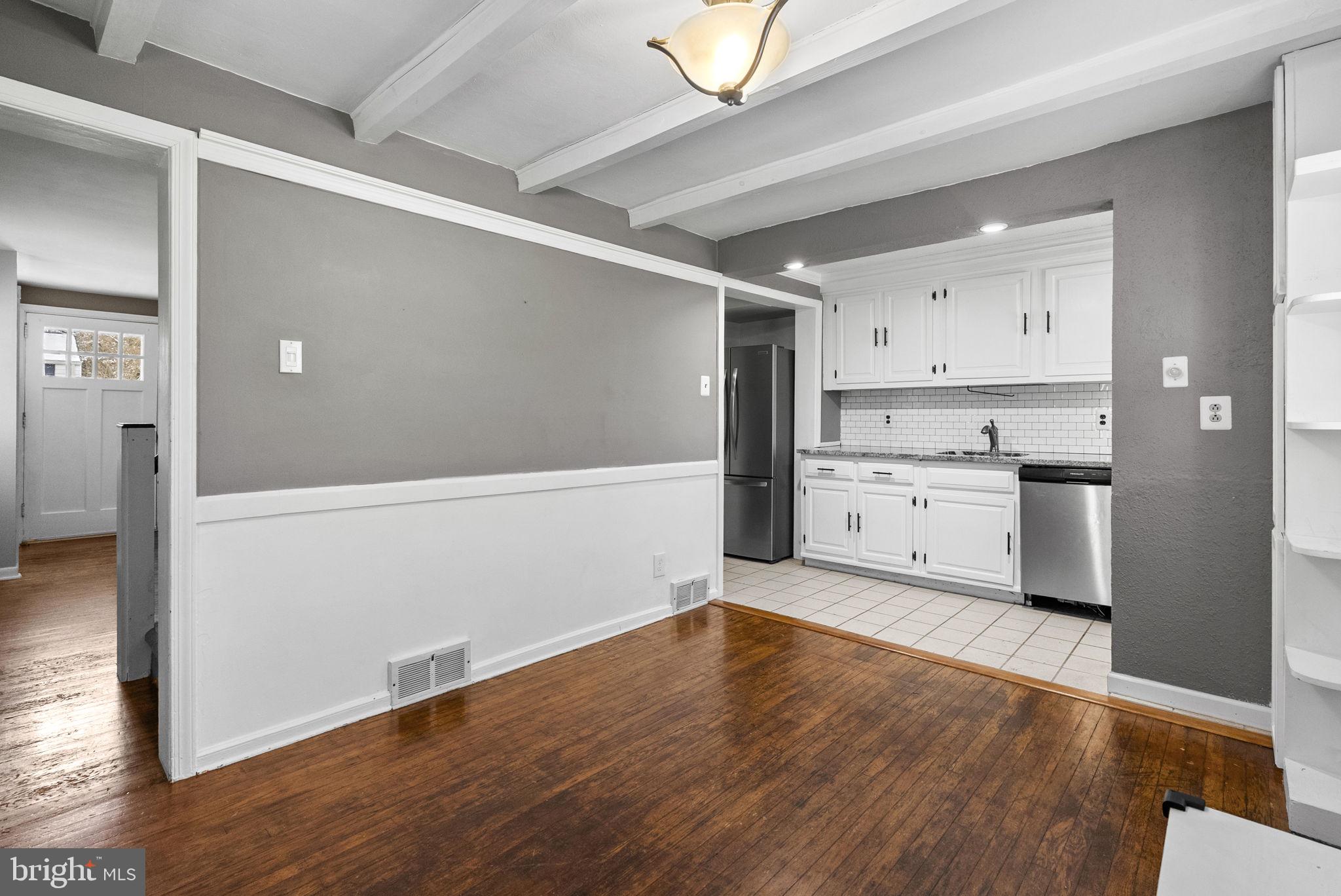 215 Allison Road Oreland, PA 19075 - Photo 10 of 39 a view of a kitchen with wooden floor