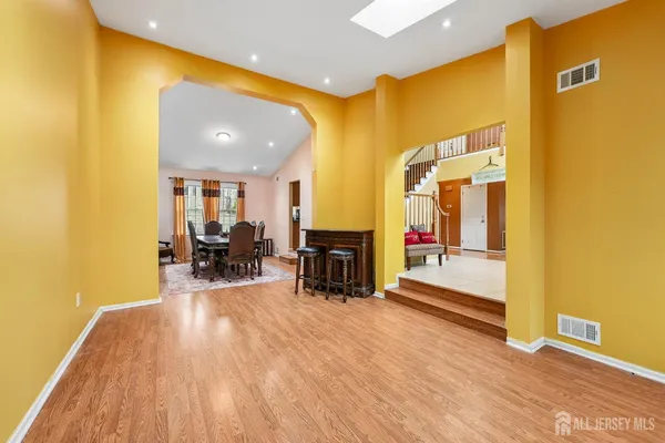 a view of a living room with a large window