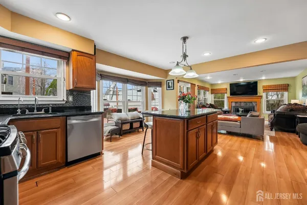 a large kitchen with lots of counter space and a sink