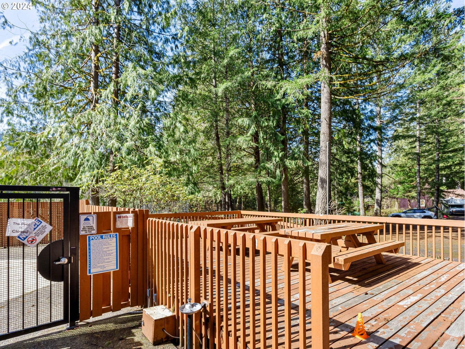 64680 East Sandy River Lane Rhododendron, OR 97049 - Photo 12 of 23 a view of a wooden fence