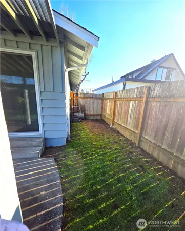 a view of a backyard with stairs