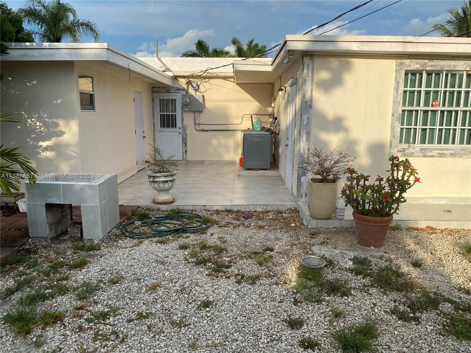 29220 Kansas Road Homestead, FL 33033 - Photo 12 of 16 a view of a porch with plants