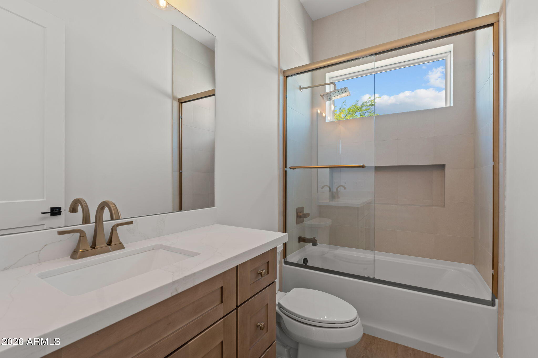 2855 Percheron Road Wickenburg, AZ 85390 - Photo 40 of 58 a bathroom with a sink a mirror toilet and bathtub
