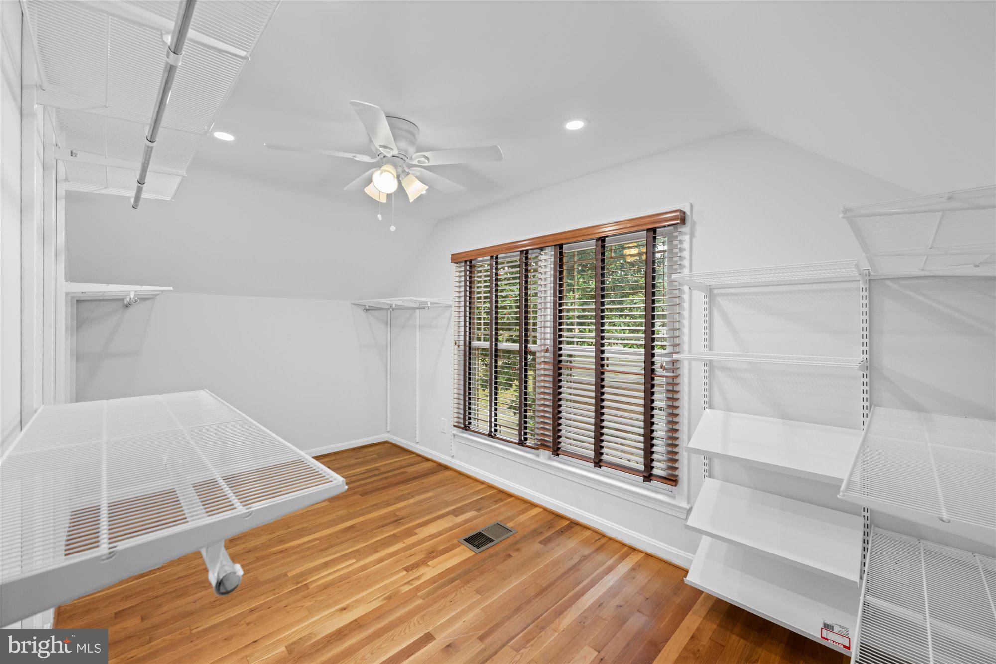 8311 Aqueduct Road Potomac, MD 20854 - Photo 16 of 27 a view of an empty room with a window