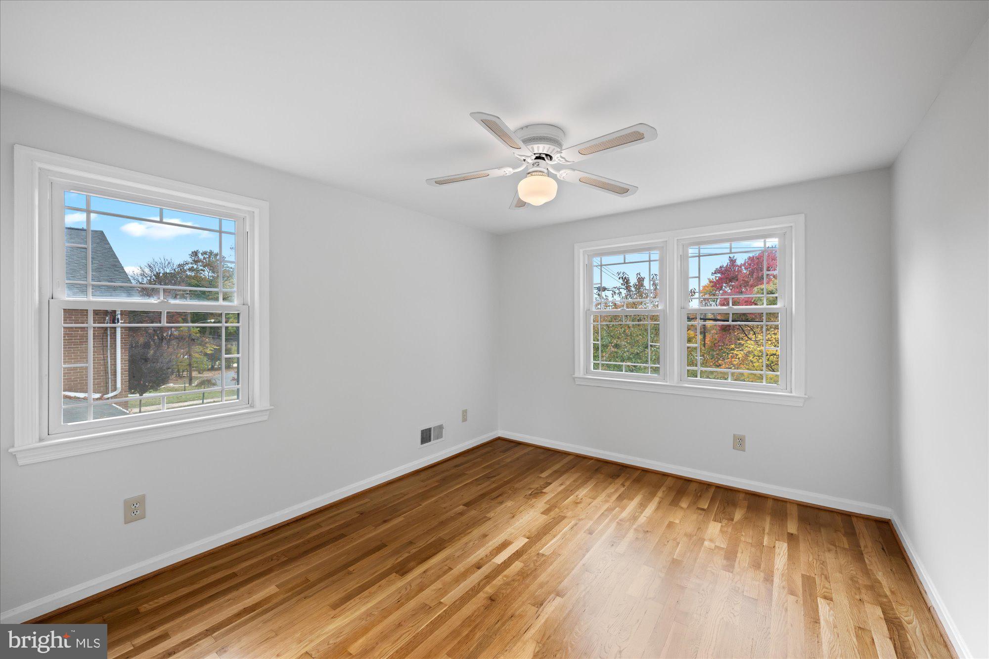 8311 Aqueduct Road Potomac, MD 20854 - Photo 18 of 27 a view of an empty room with a window