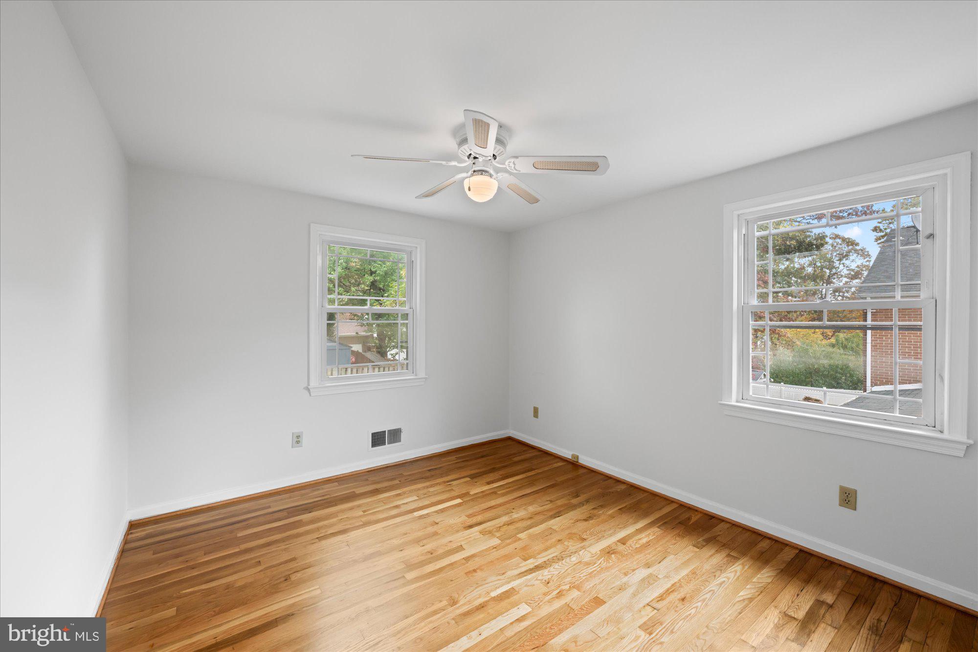 8311 Aqueduct Road Potomac, MD 20854 - Photo 19 of 27 a view of empty room with window