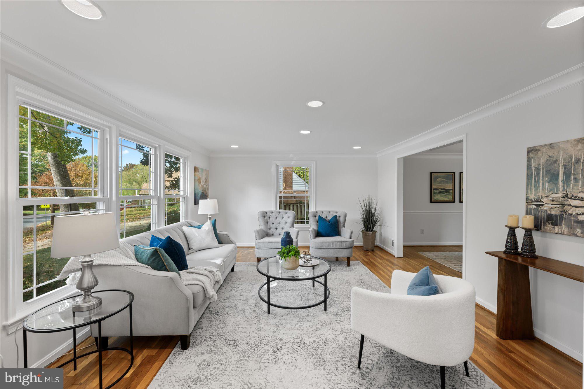 8311 Aqueduct Road Potomac, MD 20854 - Photo 3 of 27 a living room with furniture and a large window